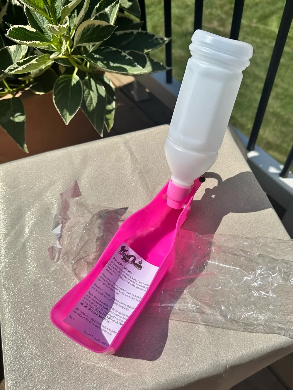 Oasis Pink Travel Bottle with Silicone Carrier for dog